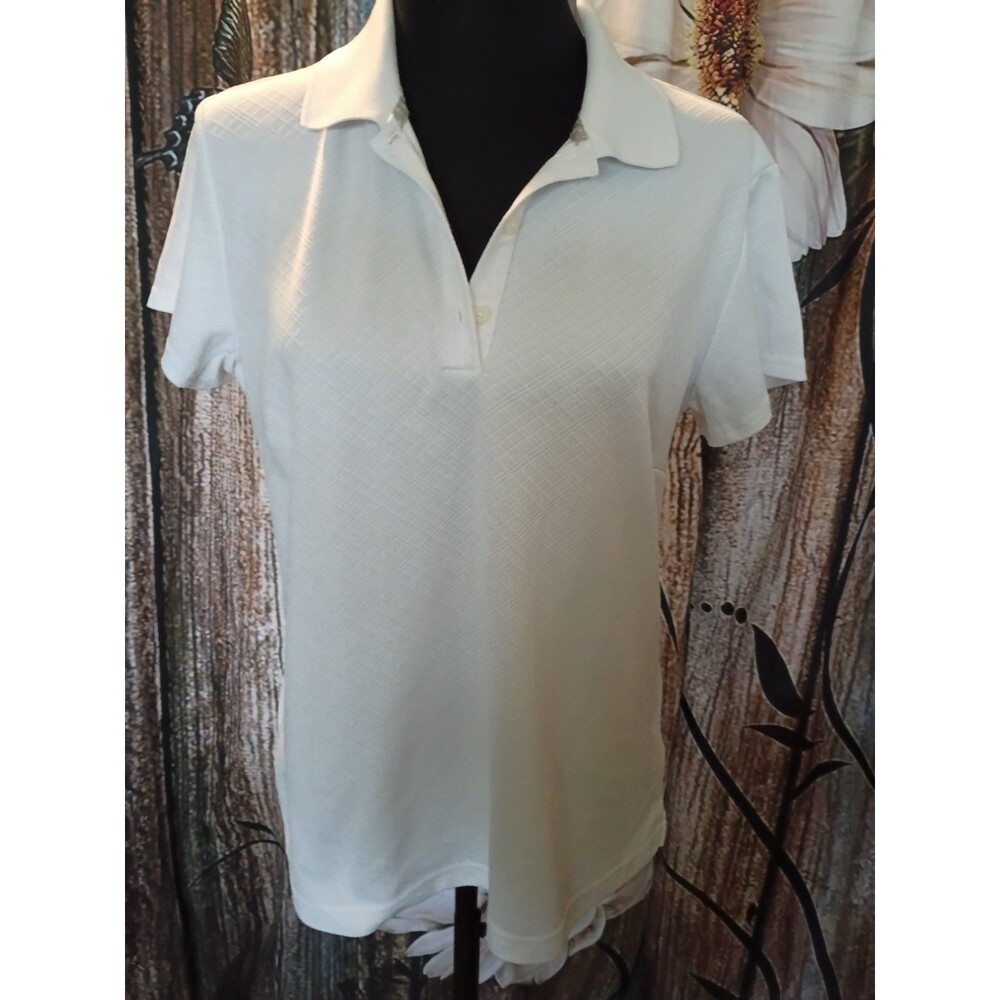 Adidas athletic golf polo shirt featuring a distinct diamond-textured piqué